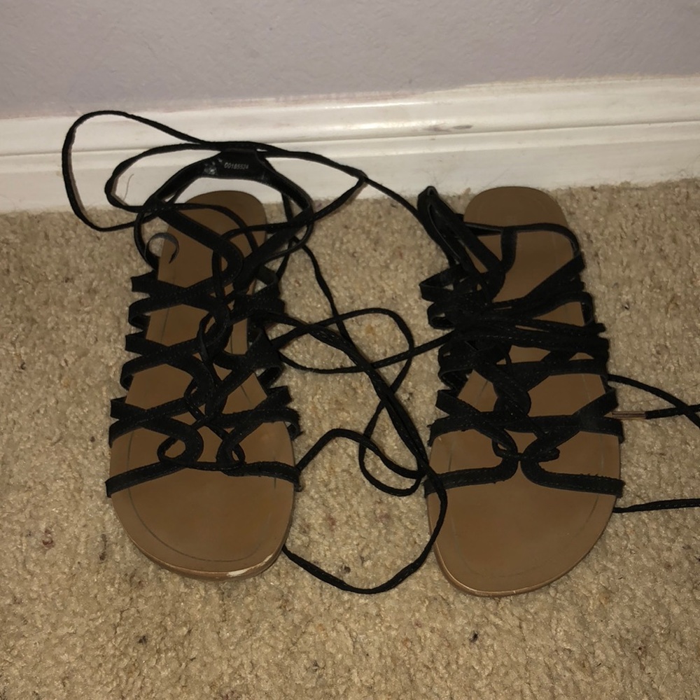 Roman knee-high sandals